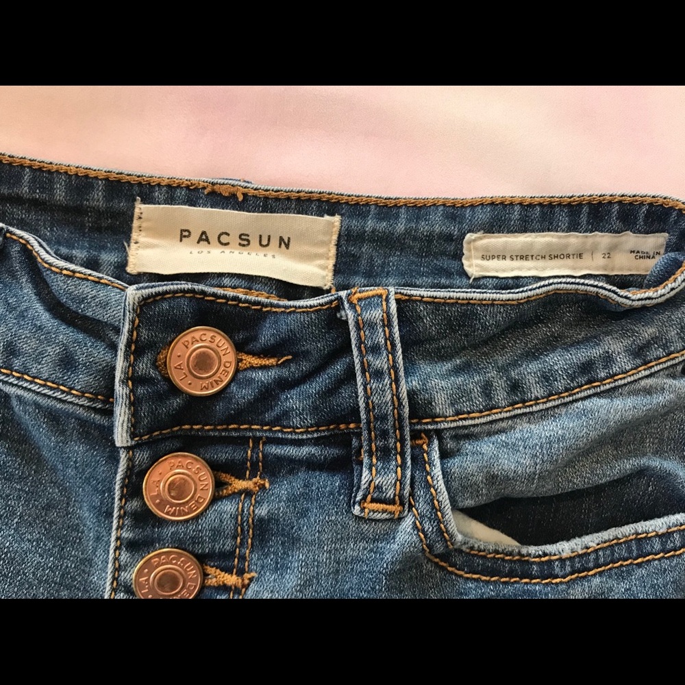 Mid-rise, blue jean shorts